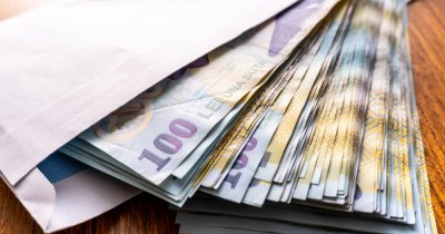 România cash-ului. Cum scot românii salariul de pe card